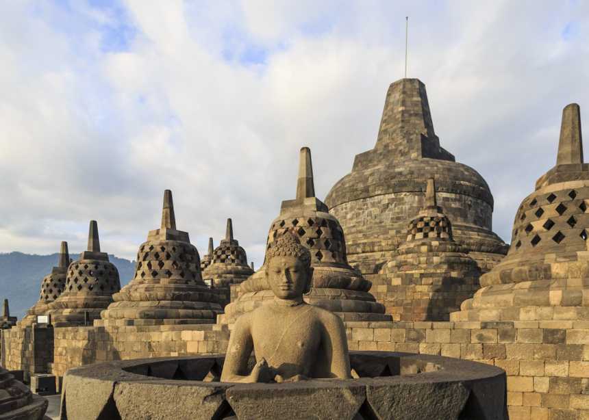 Exposed Buddha image within the stupas of Borobudur upper terraces