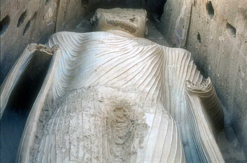 East Buddha (detail with drapery in 1975), c. 6th-7th c C.E., stone, stucco, painted, 120 feet high, Bamiyan, Afghanistan, destroyed 2001