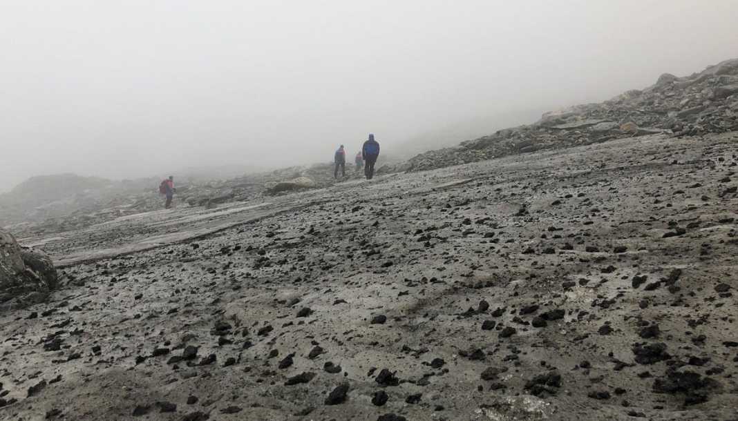 The Lendbreen ice patch in Norway, pictured here in 2019, is melting, revealing horse dung left by travellers who crossed the area centuries ago.