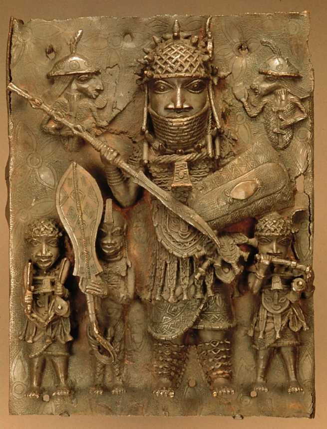 A cast brass plaque depicting warriors of the kingdom of Benin
