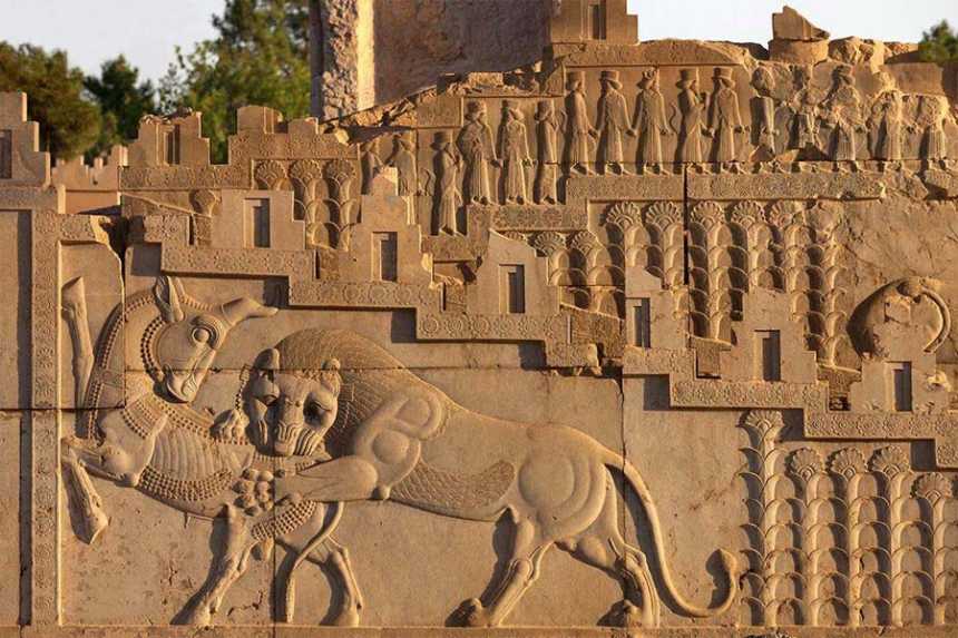 A bas-relief at Persepolis, representing a symbol in Zoroastrianism for Nowruz.